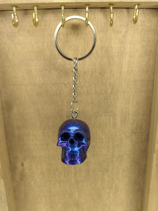Porte-clé noir & mica bleu – Ombre polie, éclat glacé 🗝️